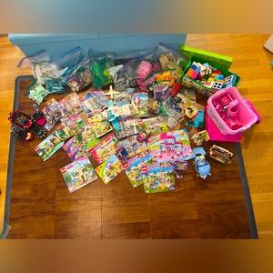 Mixed Pieces of Over 18 LEGO Sets and Two Duplo LEGO Boxes